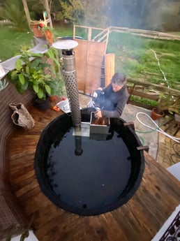 Finnish hot tubs are known for their traditional, natural feel and the use of wood as a heating source, providing a unique and cozy experience.